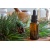 bigstock-a-bottle-of-essential-oil-with-251688253